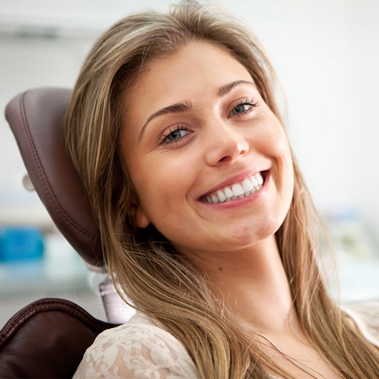 a woman after a braces consultation