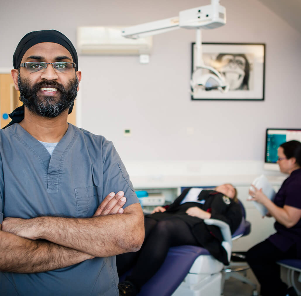 Doctor at loughborough Orthodontics preparing for an adults braces consultation